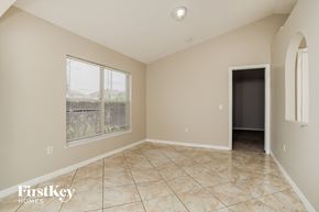 Kissimmee house for rent - the living room of an empty house with a large window