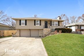 Lee's Summit house for rent - A two-story house with a garage is for sale.