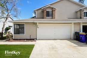 Rockledge house for rent - the front of a house with a white garage door