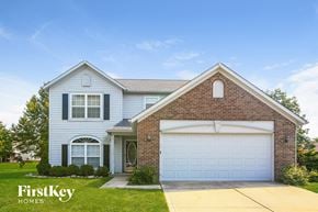 Fishers house for rent - a white house with a white garage door
