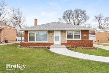South Holland house for rent - a small brick house with a sidewalk in front of it