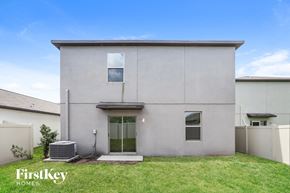 Riverview house for rent - A house with a grey exterior and a small front yard.