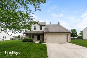 Bargersville house for rent - a white house with a garage and a lawn