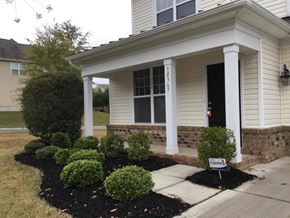 Huntersville house for rent - a front porch with a sign in front of a house