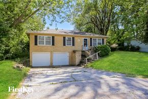 Independence house for rent - A two-car garage with a brick exterior and a white door.