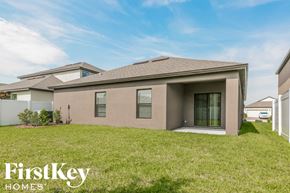 Melbourne house for rent - a house with a grassy yard in front of it