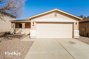 San Tan Valley house for rent - a home with a white garage door and a driveway