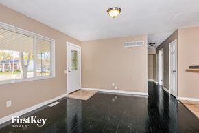 Florissant house for rent - the living room and entryway of an empty house