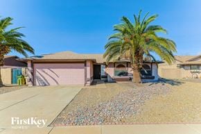 Glendale house for rent - a house with a palm tree in front of it