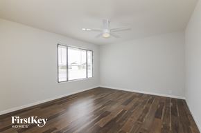 Glendale house for rent - a living room with wood flooring and a ceiling fan