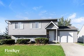 Indianapolis house for rent - a with a white garage door