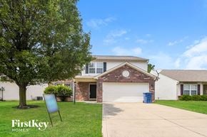 Fishers house for rent - A house with a sign that says FirstKey Homes in front of it.