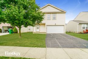 Blacklick house for rent - A house with a tree in front of it.