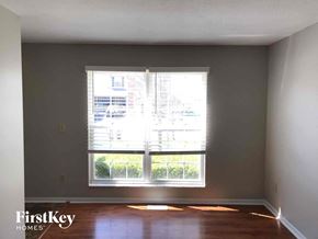 Blacklick house for rent - a living room with a window and wood floors