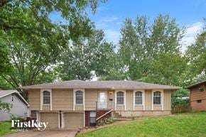Kansas City house for rent - A house with a garage is for sale.