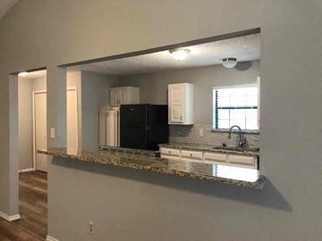 Flower Mound house for rent - a view of a kitchen with a granite counter top