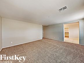 Peoria house for rent - the living room is spacious and ready for you to use