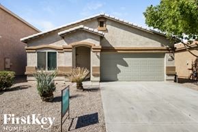 San Tan Valley house for rent - a house with a driveway and a garage door