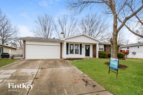 Saint Charles house for rent - A house with a sign that says FirstKey Homes in front of it.