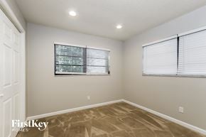 Wellington house for rent - the living room is spacious and clean with a large window