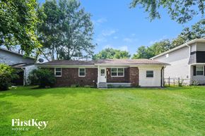Indianapolis house for rent - A house with a lawn in front of it.
