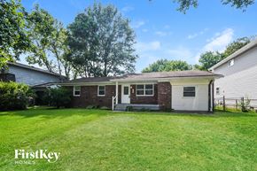 Indianapolis house for rent - A house with a lawn in front of it.