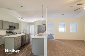 Jacksonville house for rent - a kitchen and living room with an open floor plan