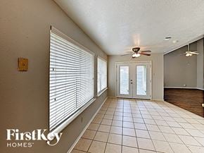 Houston house for rent - the spacious living room has a large window overlooking the patio