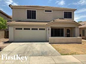 El Mirage house for rent - A two-story house with a garage is for sale by FirstKey Homes.
