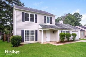 Stone Mountain house for rent - A house with a grey roof and a white door.
