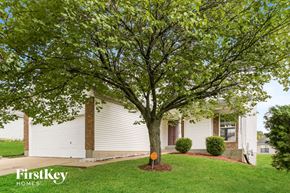 Black Jack house for rent - a house with a large tree in front of it