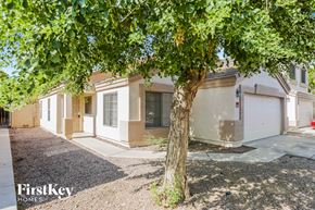 El Mirage house for rent - a house with a tree in front of it