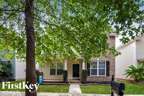 Huntersville house for rent - a house with a tree in front of it