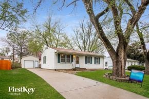 Grandview house for rent - A house with a tree in front of it.
