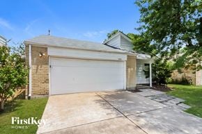 Houston house for rent - A two-car garage is attached to a house.