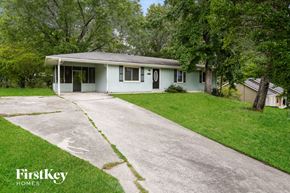 Conyers house for rent - A house with a driveway in front of it.