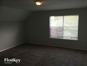 Houston house for rent - an empty room with a large window