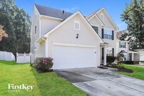Mcleansville house for rent - A white house with a garage is for sale by FirstKey Homes.