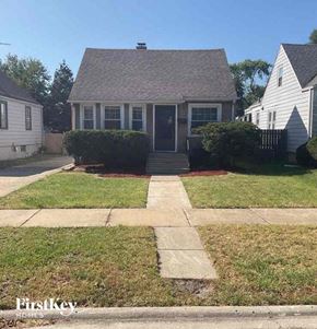 Dolton house for rent - a house with a sidewalk in front of it