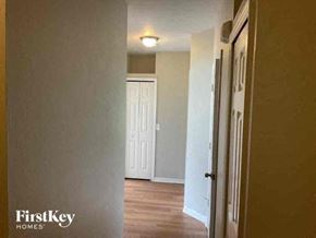 North Port house for rent - a hallway with a door and a light on the ceiling