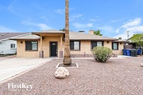 Mesa house for rent - A house with a brown roof and tan walls is for sale.