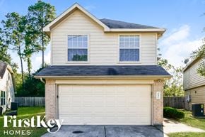 Houston house for rent - the exterior of a house with a white garage door
