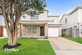 Houston house for rent - A house with a tree in front of it is for sale.