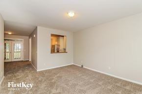 Cumming house for rent - the living room and dining room are spacious and clean