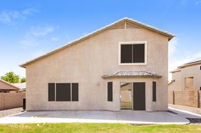 Surprise house for rent - A modern house with a flat roof and a covered entrance.