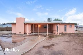 Glendale house for rent - a building with a puddle of water in front of it