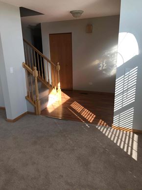 Crest Hill house for rent - a view of a stairway in a house with wood floors