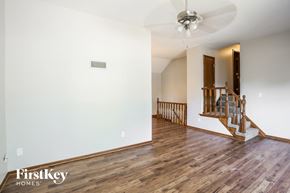 Independence house for rent - a living room with hardwood floors and a staircase