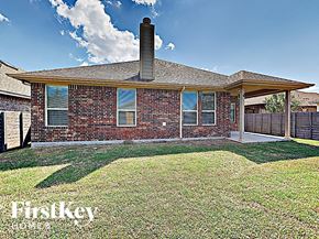 Argyle house for rent - the front of a brick house with a grassy yard