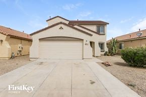 San Tan Valley house for rent - a white house with a garage and a driveway
